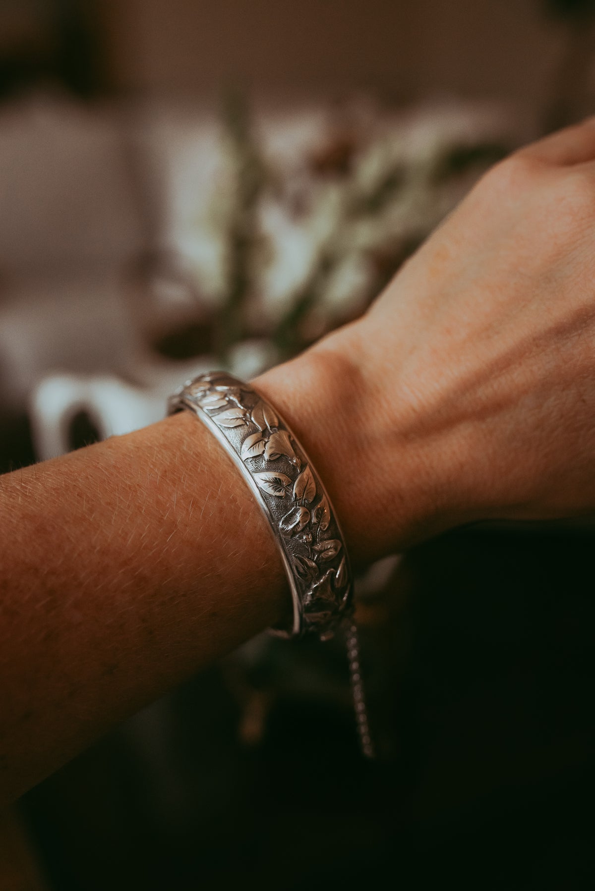 Victorian Sterling Silver Repoussé Hinged Bracelet with safety chain Floral Motif